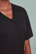Womens Parks Zip Front Crossover Scrub Top ||SRC=https://cdn.fashionbizapps.nz/honeybee/images/CST240LS_Talent_Black_03.jpg