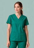 Unisex Classic Scrub Top ||SRC=https://cdn.fashionbizapps.nz/honeybee/images/H10612_Talent_HunterGreen_01.jpg