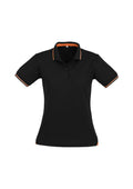 Womens Jet Short Sleeve Polo - Black/Orange ||SRC=https://cdn.fashionbizapps.nz/honeybee/images/P226LS_bProduct_Black_Orange_01_iYJjz8p.jpg